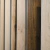 Wood flooring samples displaying a range of light and dark wood tones, grains, and textures.